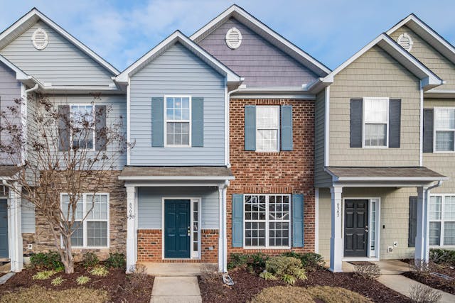 duplexes with blue and grey siding