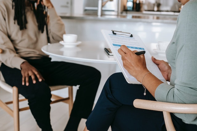 people sitting at table for interview