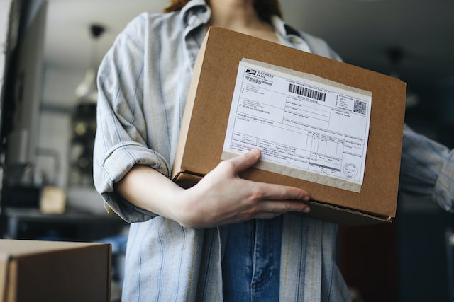 person holding mail