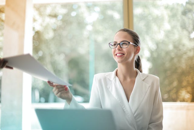 landlord-handing-documents