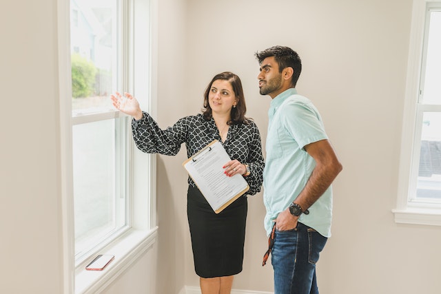 people inspecting property